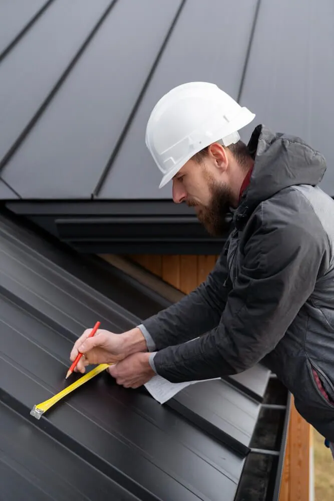 man-working-roof-medium-shot